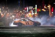 Denny Hamlin drives during the 2021 NASCAR Burnouts on Broadway event in Nashville. Source: Imagn